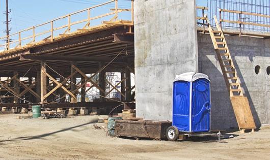 workers' rest area equipped with porta potties for added convenience